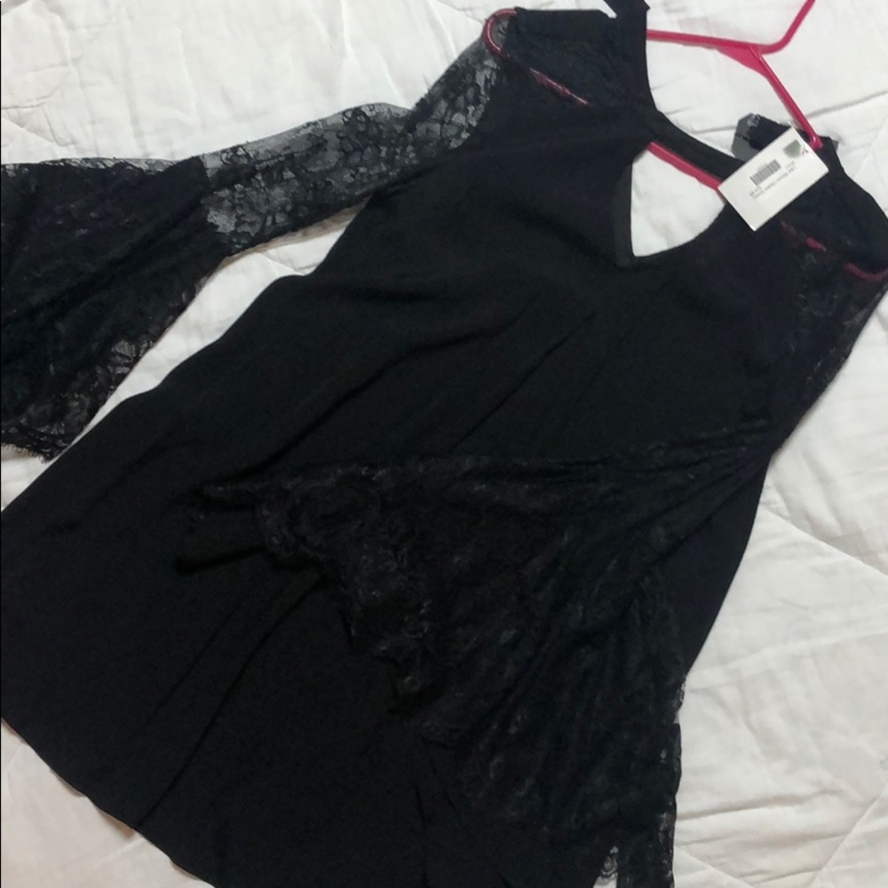 Flowy black sleeved dress